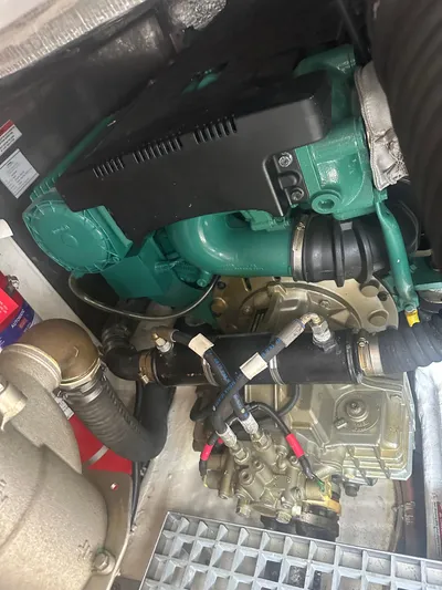 Knot Guilty Yacht Photos Pics Engine compartment of a 2016 Galeon 380 Fly yacht, showcasing mechanical components.