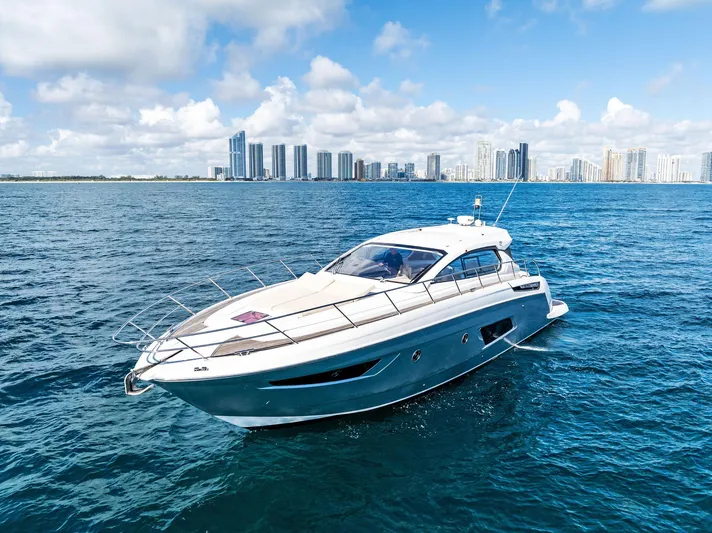 Manik Yacht Photos Pics Azimut Atlantis 50 yacht cruising near city skyline, 2016 model.