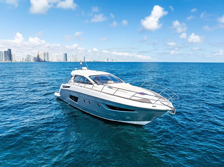 Manik Yacht Photos Pics Azimut Atlantis 50 yacht cruising on open sea, 2016 model, clear blue sky.