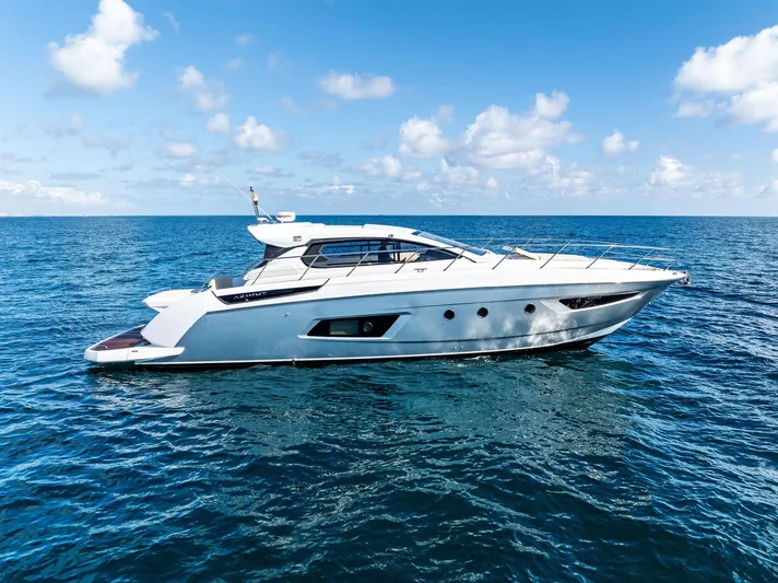 Manik Yacht Photos Pics 2016 Azimut Atlantis 50 yacht cruising on open sea under clear blue sky.