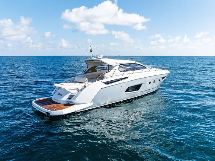 Manik Yacht Photos Pics Azimut Atlantis 50 yacht, 2016 model, cruising on open sea under clear skies.