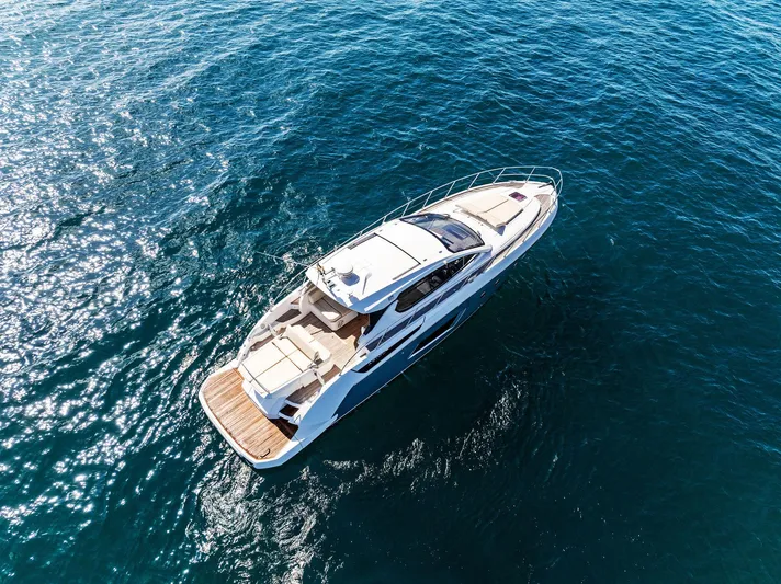 Manik Yacht Photos Pics Azimut Atlantis 50 yacht, 2016 model, cruising on clear blue water.