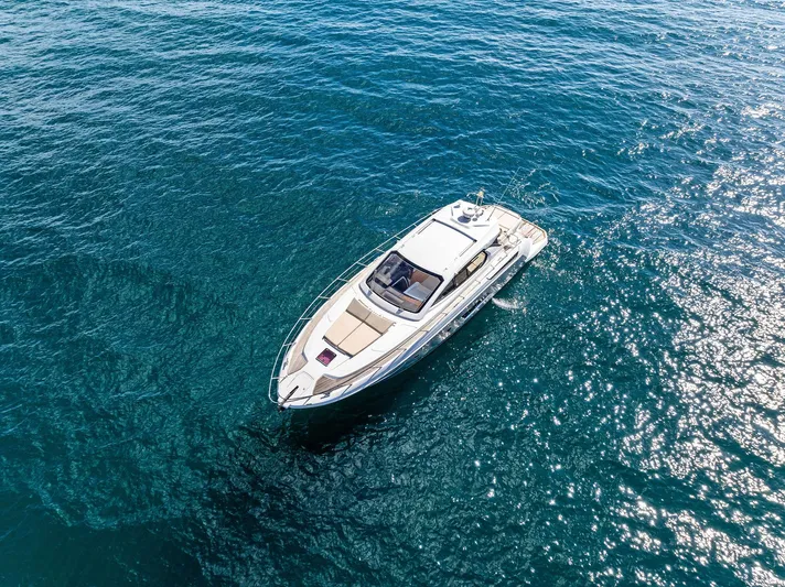 Manik Yacht Photos Pics Azimut Atlantis 50 yacht, 2016 model, cruising on clear blue water.