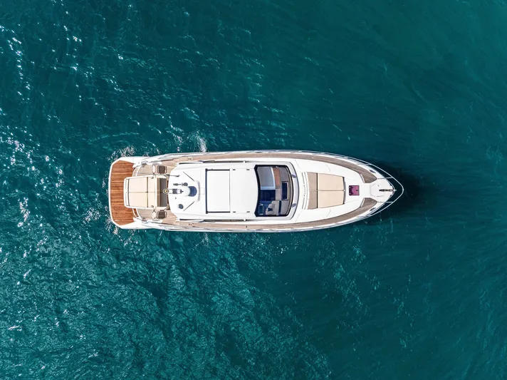 Manik Yacht Photos Pics Azimut Atlantis 50 yacht, 2016 model, aerial view on blue ocean water.