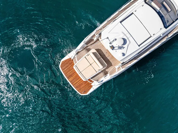 Manik Yacht Photos Pics Aerial view of 2016 Azimut Atlantis 50 yacht on blue ocean water.