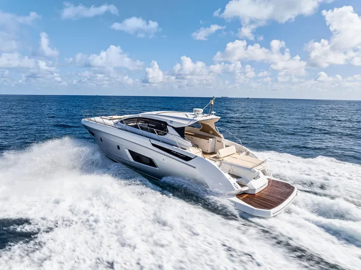 Manik Yacht Photos Pics Azimut Atlantis 50 yacht cruising on open sea, 2016 model, under clear blue skies.