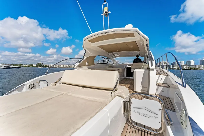 Manik Yacht Photos Pics 2016 Azimut Atlantis 50 yacht with spacious deck, cruising on a sunny day.