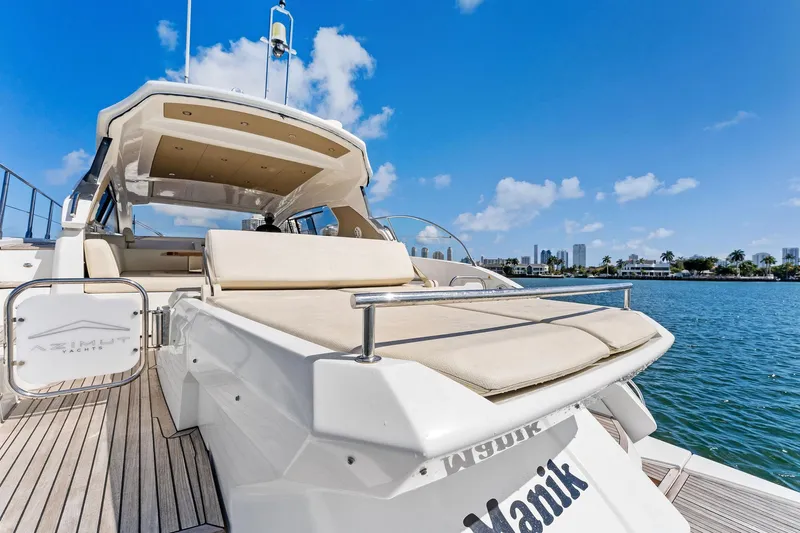 Manik Yacht Photos Pics Azimut Atlantis 50 yacht, 2016 model, docked with scenic waterfront view.