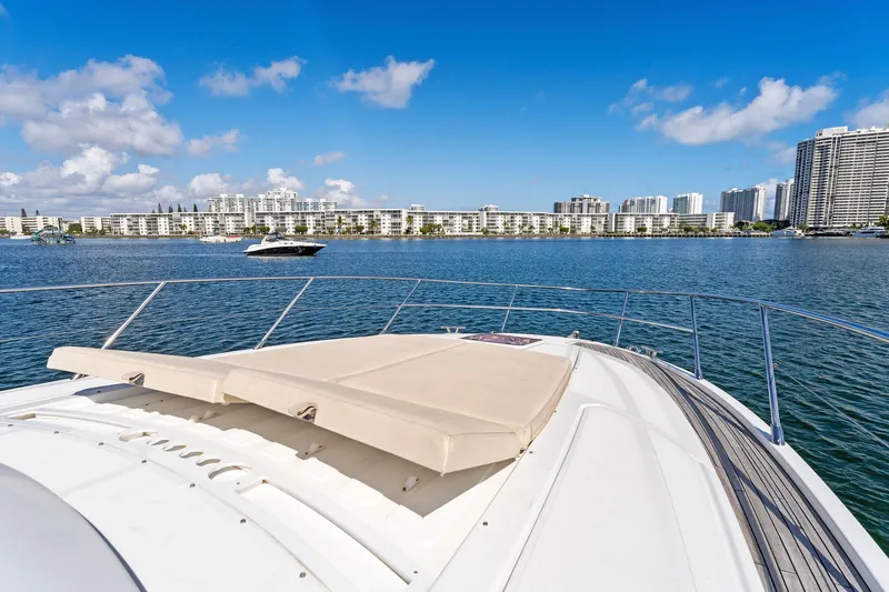 Manik Yacht Photos Pics Azimut Atlantis 50 yacht on water with city skyline, 2016 model.