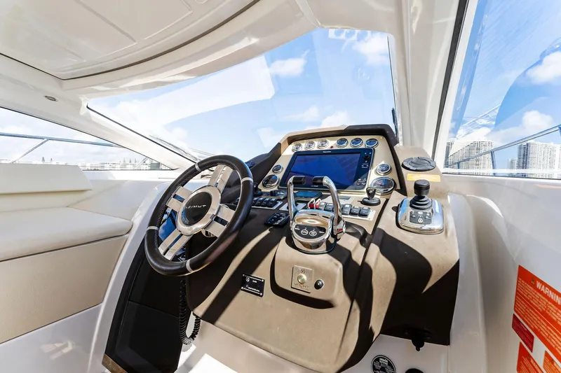Manik Yacht Photos Pics 2016 Azimut Atlantis 50 yacht helm with modern controls and navigation system.