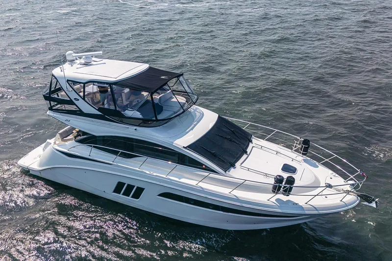  Yacht Photos Pics 2017 Sea Ray Fly 510 yacht cruising on open water.