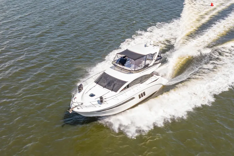  Yacht Photos Pics 2017 Sea Ray Fly 510 yacht cruising on open water.