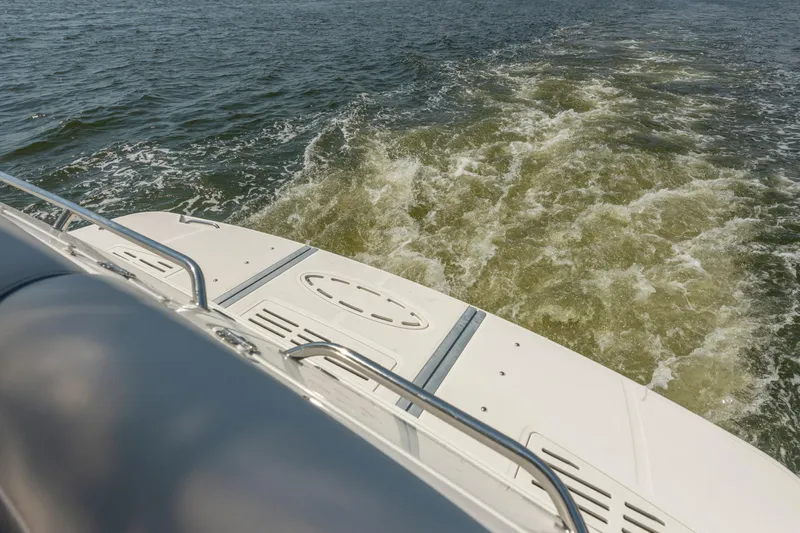  Yacht Photos Pics 2017 Sea Ray Fly 510 yacht cruising on open water, view from the deck.