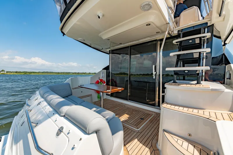  Yacht Photos Pics Luxurious 2017 Sea Ray Fly 510 yacht with spacious deck and elegant seating.