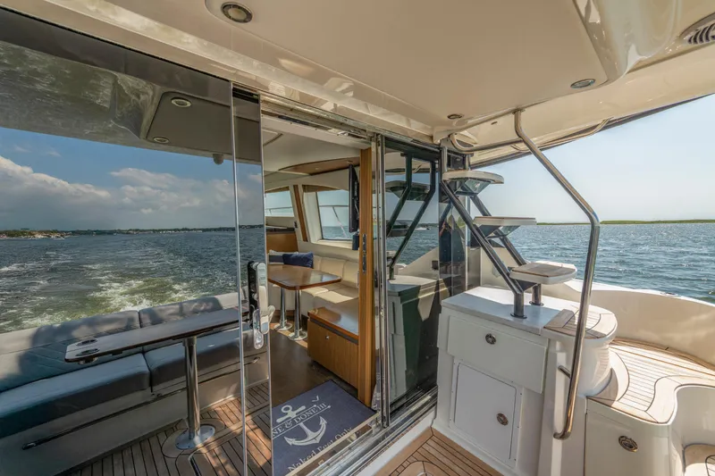  Yacht Photos Pics Luxurious 2017 Sea Ray Fly 510 yacht interior with ocean view and elegant seating area.