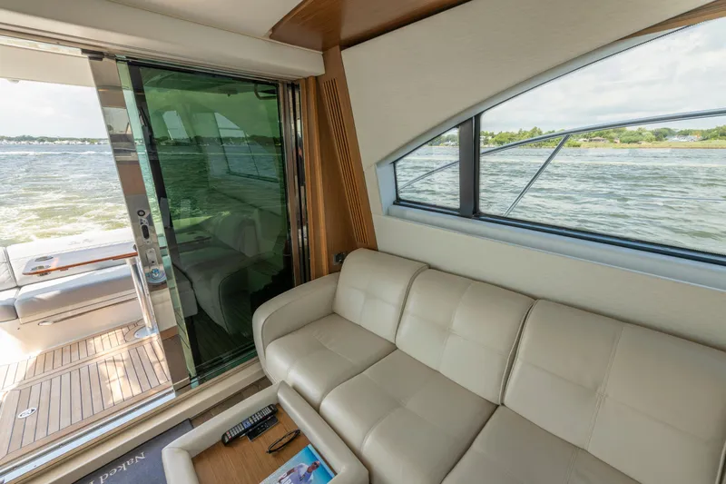  Yacht Photos Pics Luxurious interior of 2017 Sea Ray Fly 510 yacht with scenic water view.