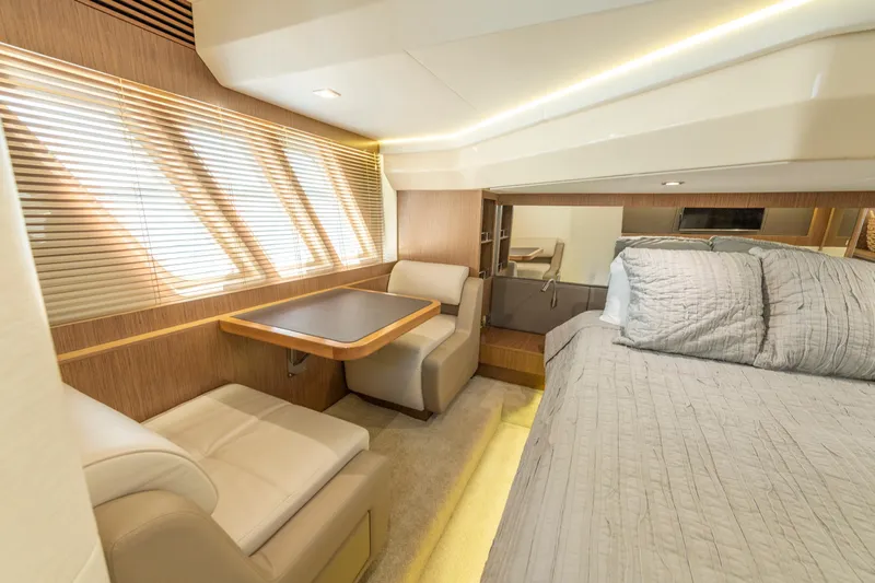  Yacht Photos Pics Luxurious interior of 2017 Sea Ray Fly 510 yacht with cozy seating and bed.