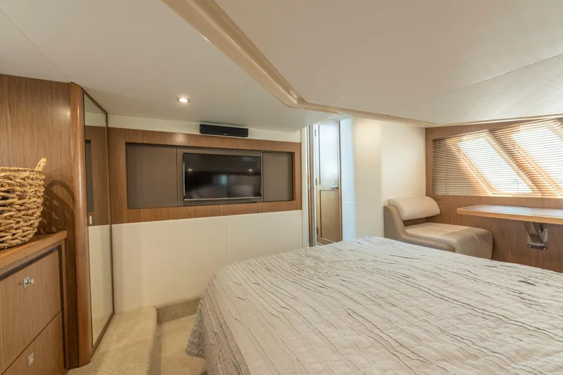  Yacht Photos Pics Luxurious interior of 2017 Sea Ray Fly 510 yacht with modern furnishings and natural light.