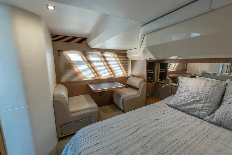  Yacht Photos Pics Luxurious interior of 2017 Sea Ray Fly 510 yacht with cozy seating and elegant decor.