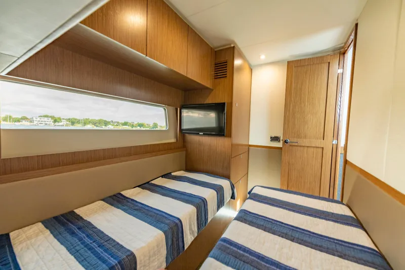  Yacht Photos Pics Luxurious 2017 Sea Ray Fly 510 cabin with twin beds and modern amenities.