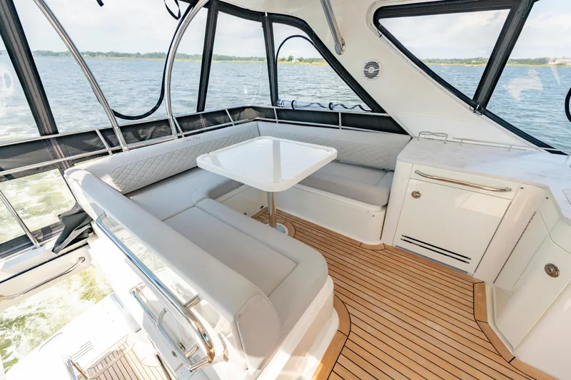  Yacht Photos Pics Luxurious 2017 Sea Ray Fly 510 yacht interior with elegant seating and scenic water view.