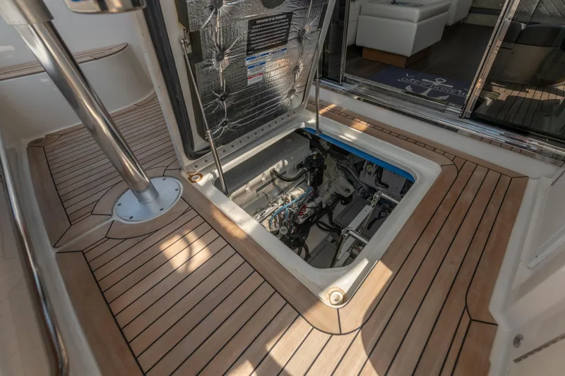  Yacht Photos Pics Engine compartment of 2017 Sea Ray Fly 510 yacht with teak flooring.