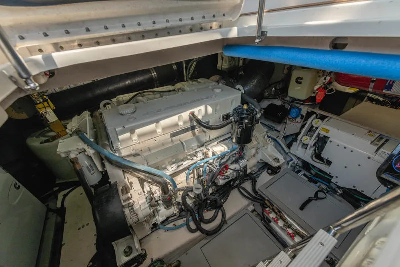  Yacht Photos Pics Engine room of 2017 Sea Ray Fly 510 yacht, showcasing mechanical components and systems.