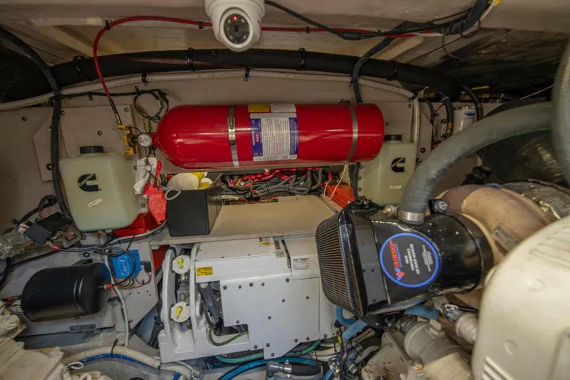  Yacht Photos Pics Engine room of a 2017 Sea Ray Fly 510 yacht, featuring mechanical components and wiring.