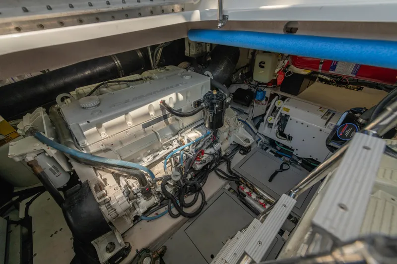  Yacht Photos Pics Engine room of a 2017 Sea Ray Fly 510 yacht, showcasing mechanical components.