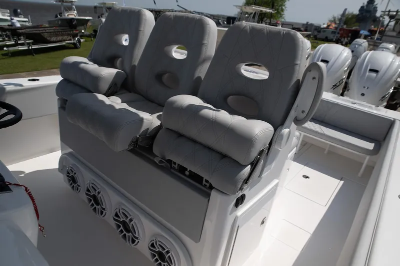  Yacht Photos Pics 2024 Contender 39 ST boat with cushioned seating and multiple speakers.