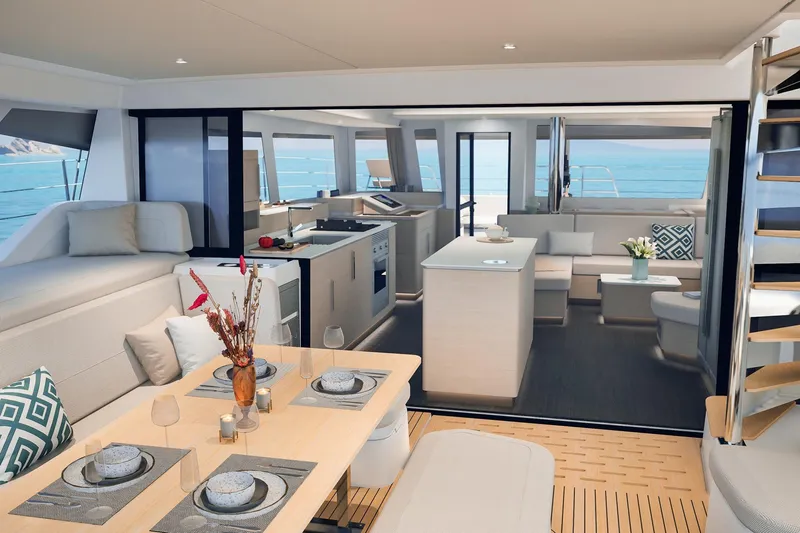  Yacht Photos Pics Luxurious interior of 2026 Fountaine Pajot FP 55 catamaran with elegant dining and seating areas.