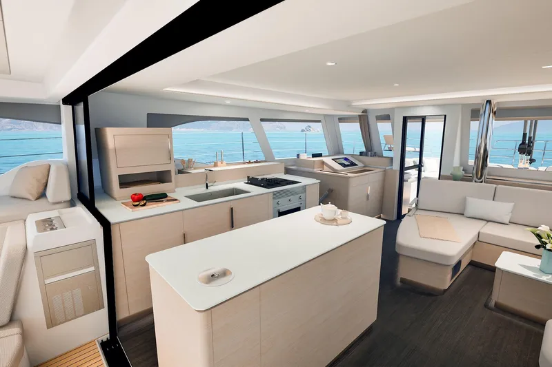  Yacht Photos Pics Luxurious interior of 2026 Fountaine Pajot FP 55 yacht with modern kitchen and seating area.