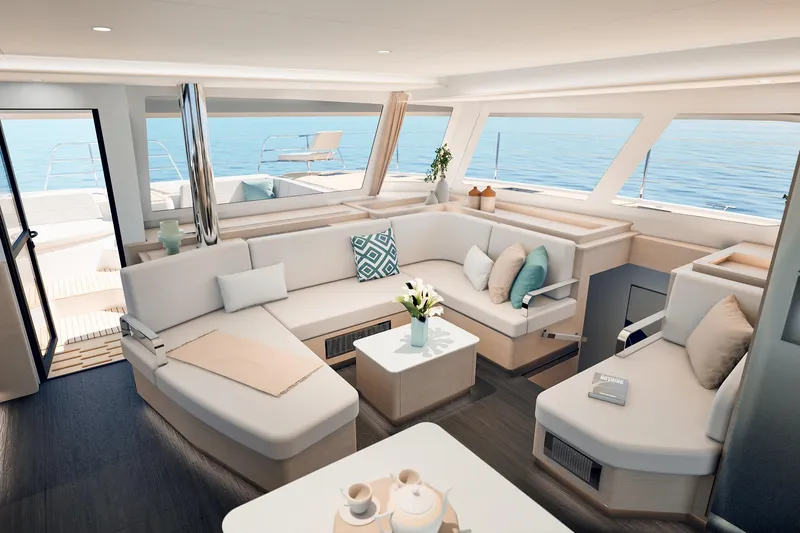  Yacht Photos Pics Luxurious interior of 2026 Fountaine Pajot FP 55 catamaran with elegant seating and ocean view.