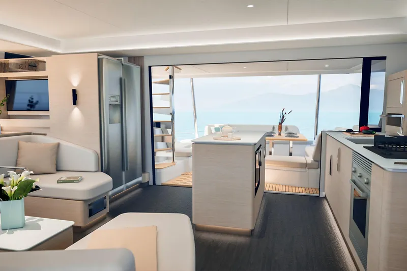  Yacht Photos Pics Luxurious interior of 2026 Fountaine Pajot FP 55 yacht with modern kitchen and seating area.