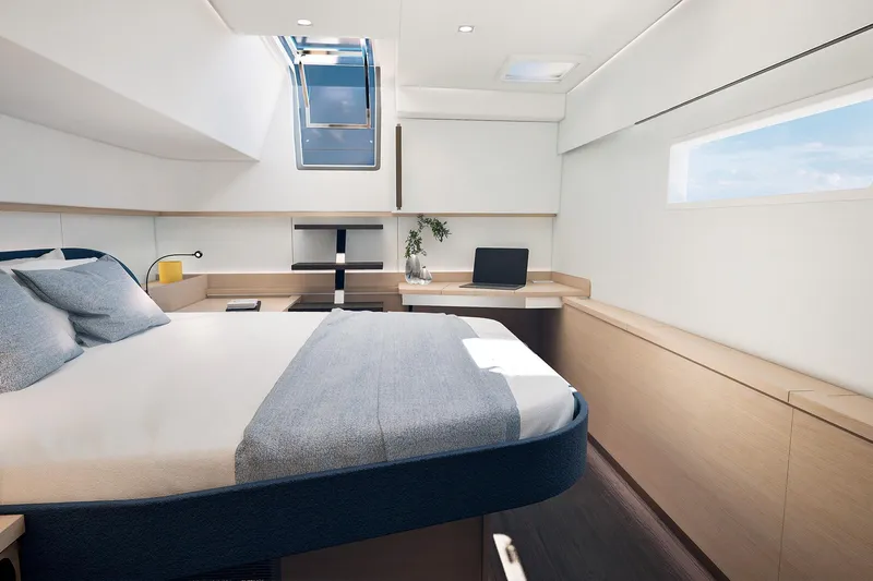  Yacht Photos Pics Modern bedroom interior of 2026 Fountaine Pajot FP 55 yacht, featuring sleek design and natural light.