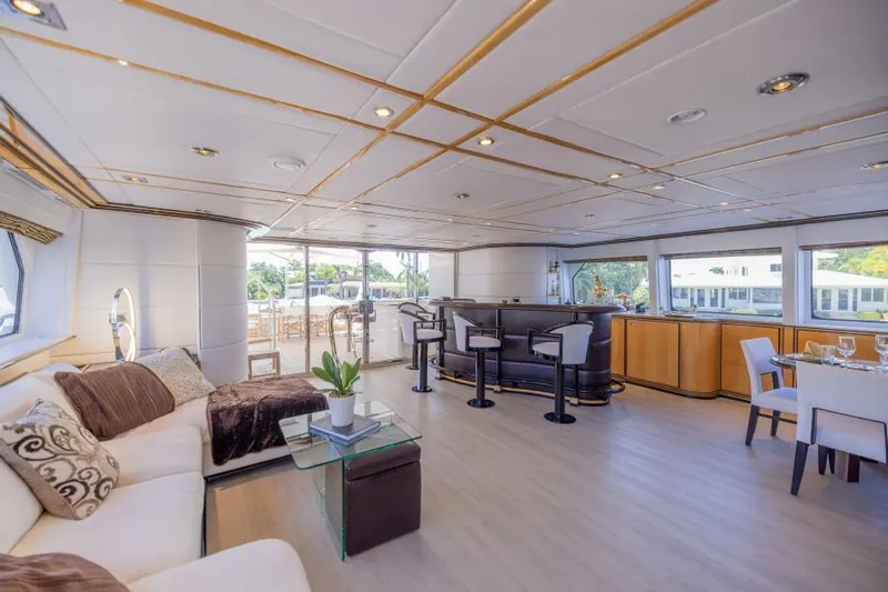 Entourage Yacht Photos Pics Luxurious interior of a 1994 Norship Pilot House yacht with modern furnishings.