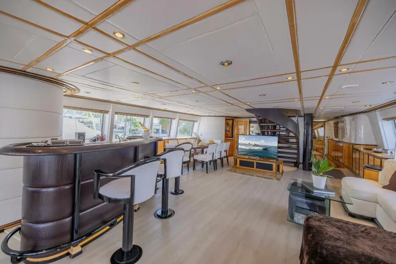 Entourage Yacht Photos Pics Luxurious interior of a 1994 Norship Pilot House yacht with modern amenities and elegant design.