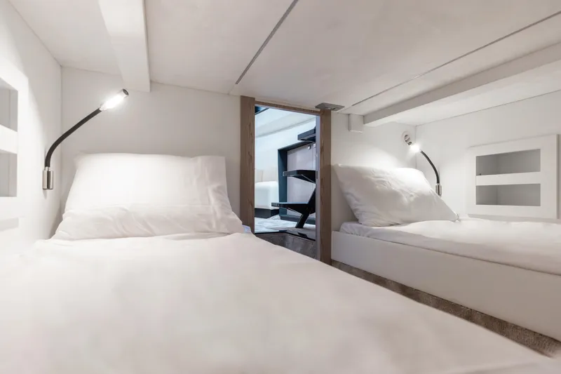  Yacht Photos Pics Interior of Anvera 48 - USA 2025 yacht with twin beds and modern lighting.