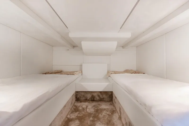  Yacht Photos Pics Luxurious twin cabin interior of 2025 Anvera 48 yacht, featuring modern white design.