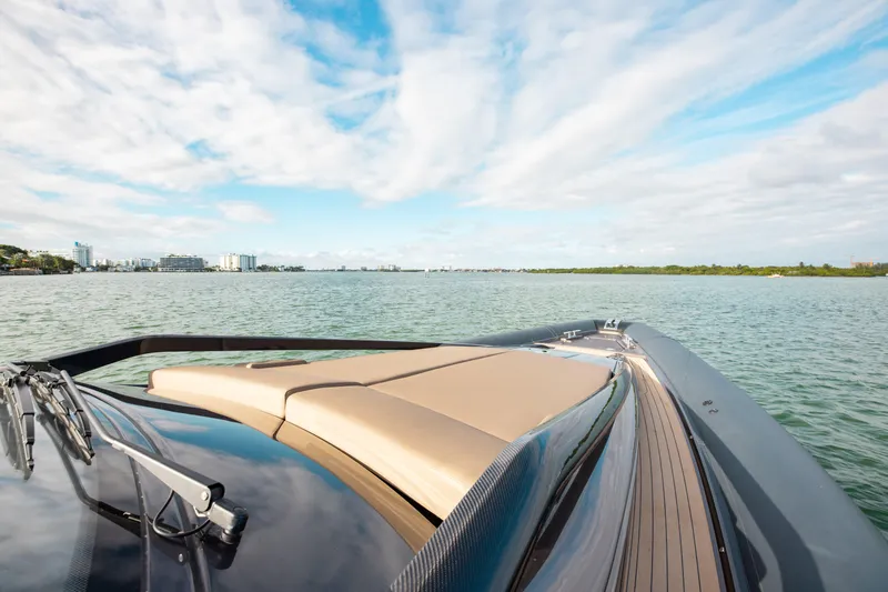  Yacht Photos Pics Luxury Anvera 48 yacht cruising on serene waters under a blue sky, 2025 model.