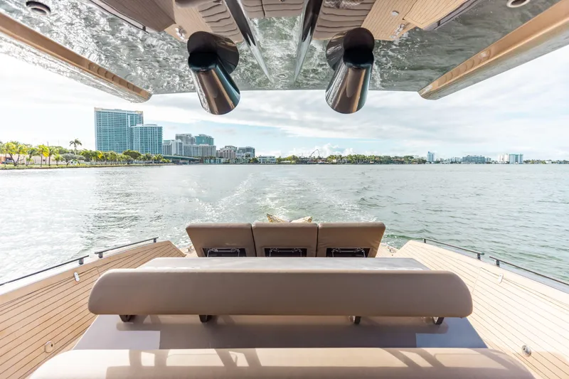  Yacht Photos Pics Anvera 48 USA 2025 luxury yacht cruising near modern city skyline.