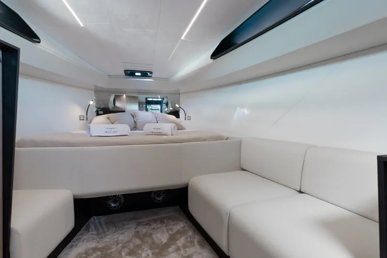  Yacht Photos Pics Luxurious interior of 2025 Anvera 48 yacht with modern white seating and bedding.