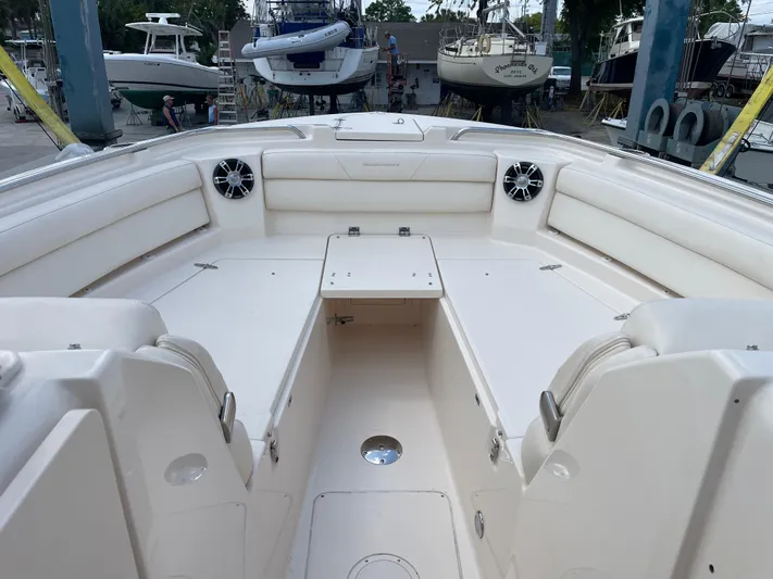 Rennie Yacht Photos Pics 2019 Grady-White Freedom 325 boat interior with spacious seating and modern design.