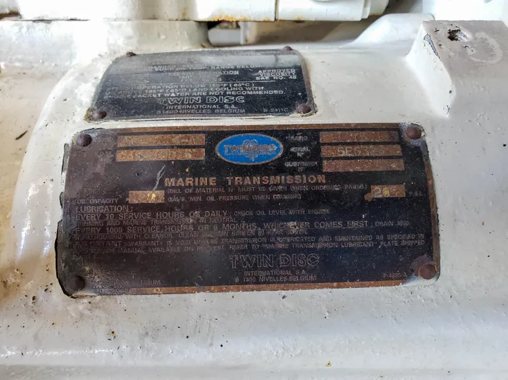  Yacht Photos Pics 1997 Sea Ray 580 Super Sun Sport marine transmission plate with Twin Disc branding.