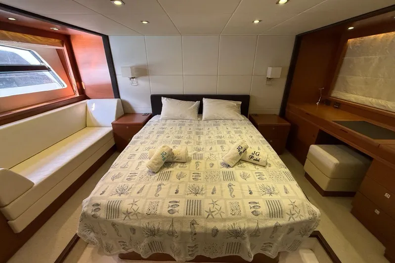  Yacht Photos Pics Luxurious bedroom in 2011 Prestige 60 yacht with elegant decor and natural light.