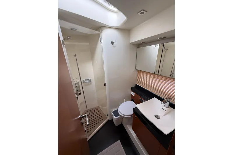  Yacht Photos Pics Luxurious bathroom in 2011 Prestige 60 yacht with modern fixtures and shower.