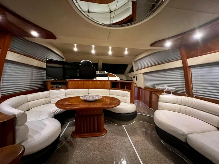  Yacht Photos Pics Luxurious interior of a 2001 Azimut 58 yacht with elegant seating and modern amenities.