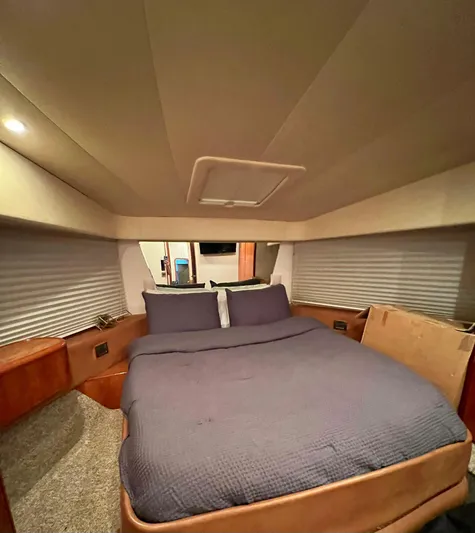  Yacht Photos Pics Luxurious bedroom in 2001 Azimut 58 yacht with cozy bedding.