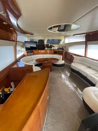  Yacht Photos Pics Luxurious interior of a 2001 Azimut 58 yacht with leather seating and wooden finishes.