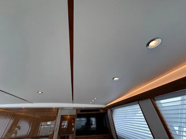  Yacht Photos Pics Interior ceiling of 2007 Viking 52 Convertibles yacht with recessed lighting and wood accents.